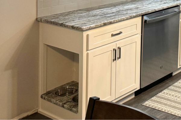 custom dog food bowl cabinet in peculiar kitchen remodel by CB Restoration