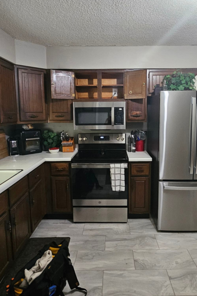 Peculiar kitchen remodel: dated peculiar kitchen with dark cabinets